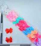 X – 007 moño en par colores pastel C12 24ZD-32