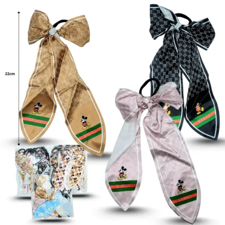 V - 009 dona tela larga estampada mickey y marcas C/12 gucci