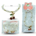 K - 007 pulsera perlas y cerezas elástica C/12 25O-51