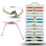 K - 010 pulsera cristales con dije marino en tira C/12 25-L12