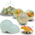 T - 006 dinosaurio en capsula C/50 061